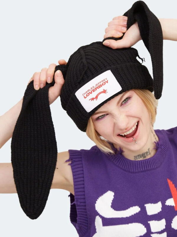 Loverboy Hat: Where Playful Rebellion Meets High-Fashion Identity