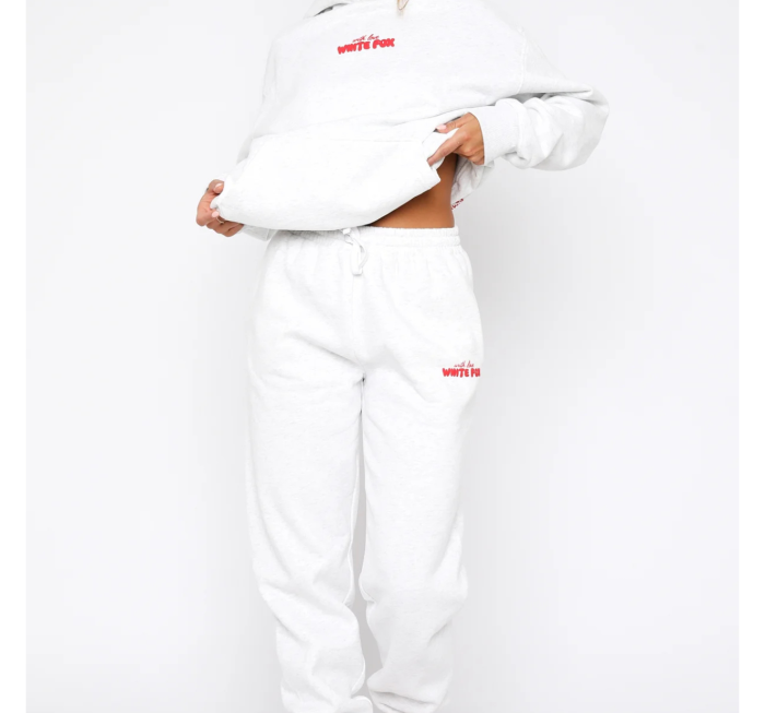 “White Fox Sweatpants for women, featuring soft fabric, relaxed fit, and contemporary streetwear design.”